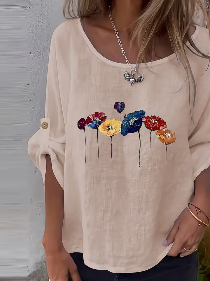 Sheril – Løs Bluse Med Blomstermønster og Rulleflapper ved Armerne