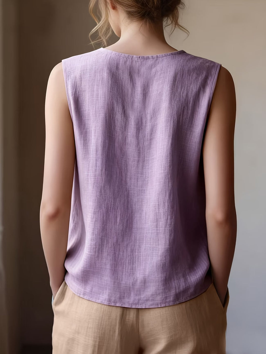 Safiya – Ærmeløs Bluse Med Flæsehalsudskæring