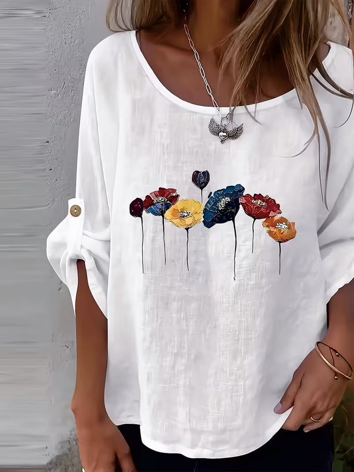 Sheril – Løs Bluse Med Blomstermønster og Rulleflapper ved Armerne