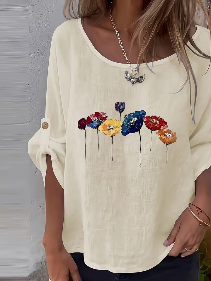 Sheril – Løs Bluse Med Blomstermønster og Rulleflapper ved Armerne