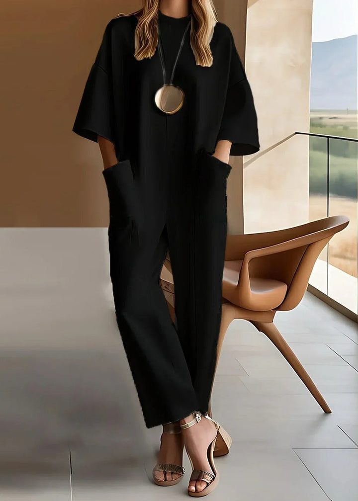 Elizina – Stilfuld, Løs Jumpsuit Med Halvlange Ærmer