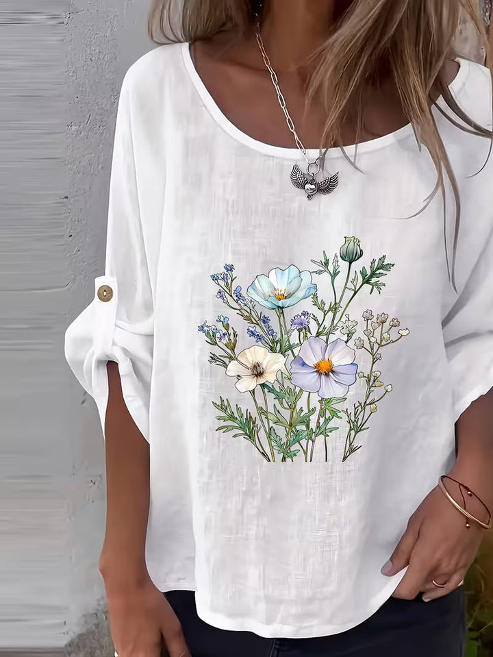Sheril – Løs Bluse Med Blomstermønster og Rulleflapper ved Armerne