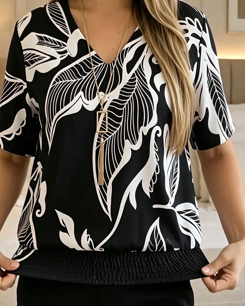 Isheba – Elegant Bluse Med Korte Ærmer