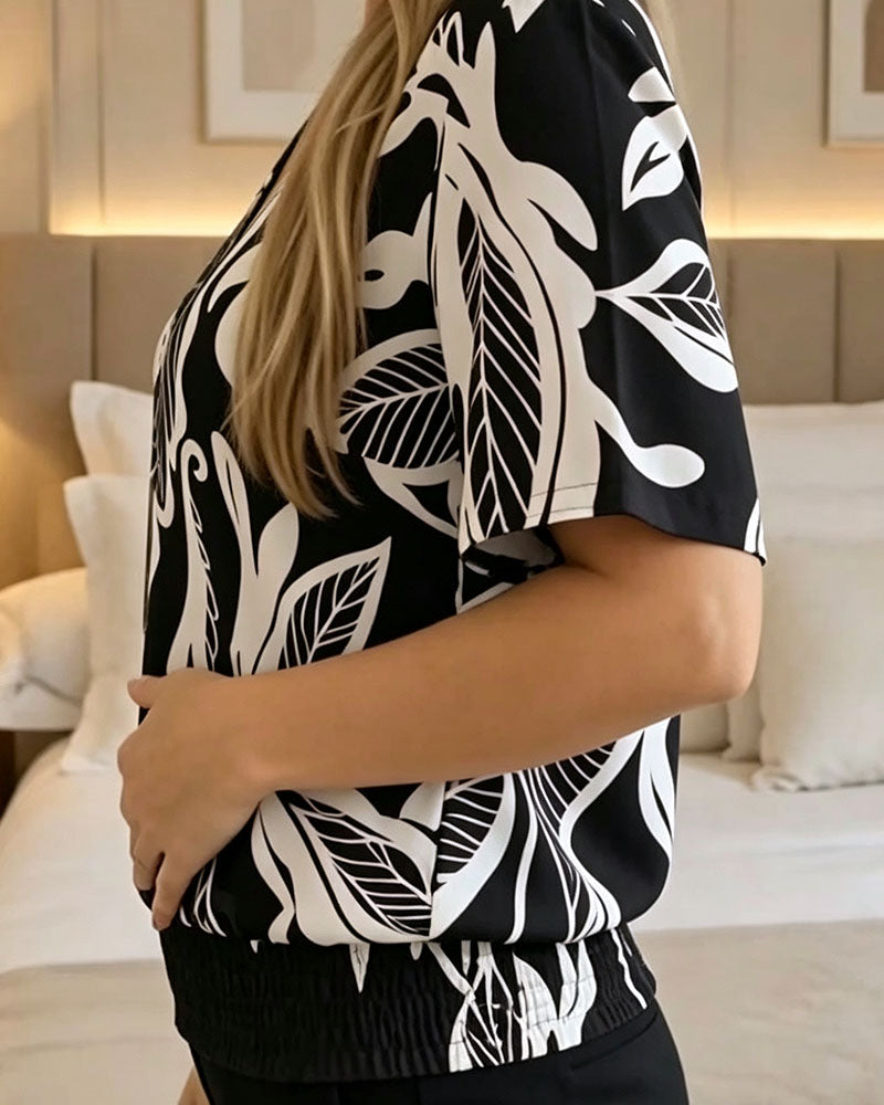Isheba – Elegant Bluse Med Korte Ærmer